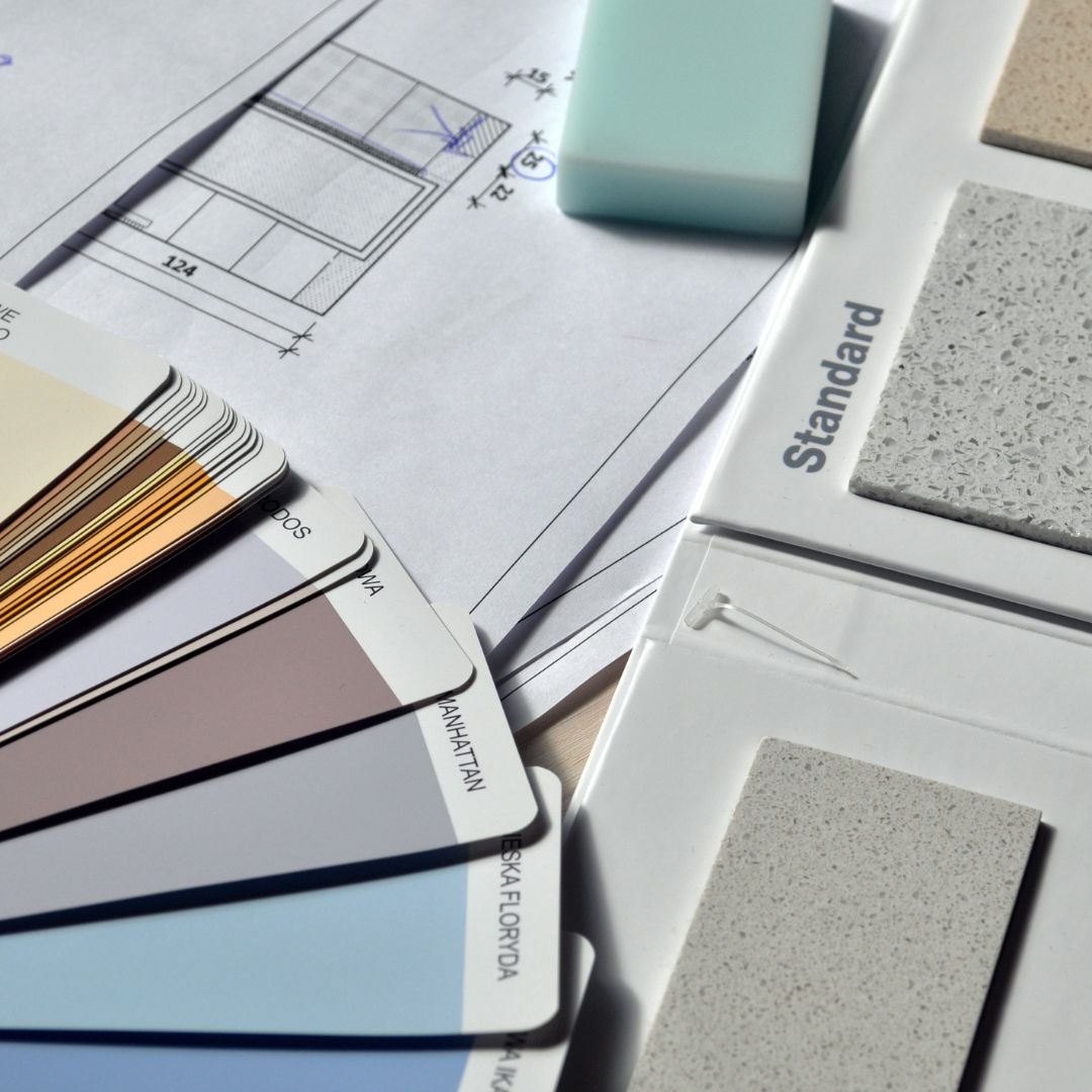 Fabric, Stone and paint swatches spread out as if for a design consultation