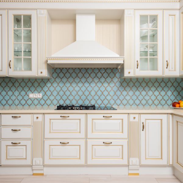White and gold accent kitchen cabinets