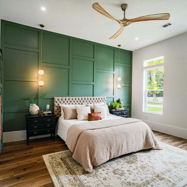 bedroom with green accent wall