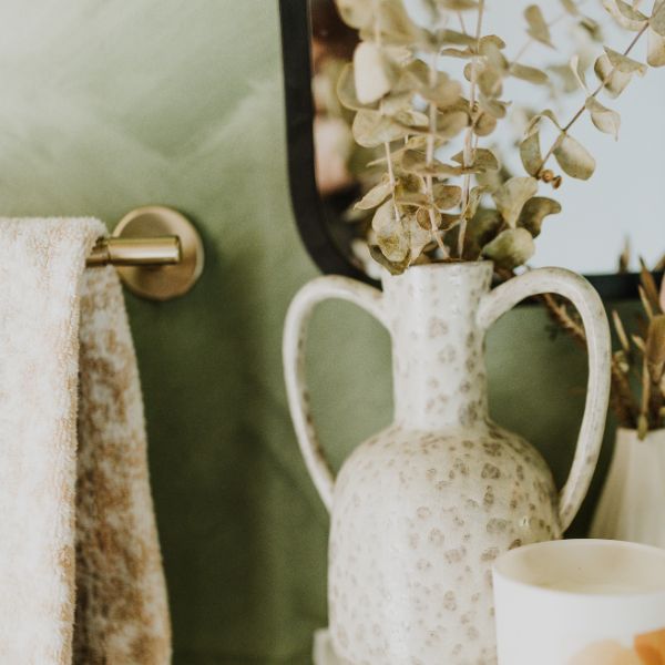 bathroom decor with green accent wall